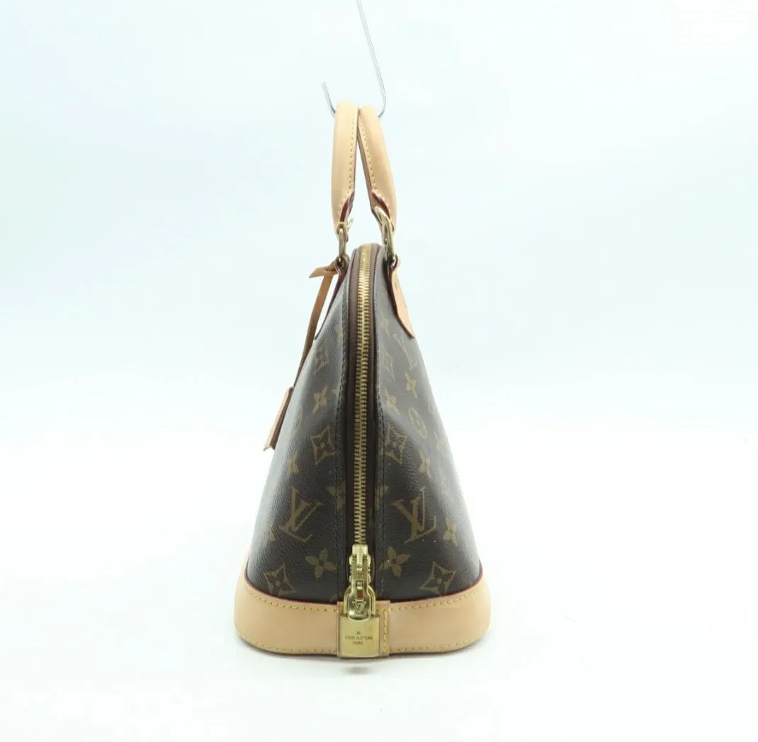 Louis Vuitton Alma Canvas Hand Bag