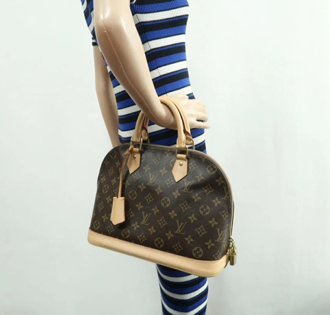 Louis Vuitton Alma Canvas Hand Bag