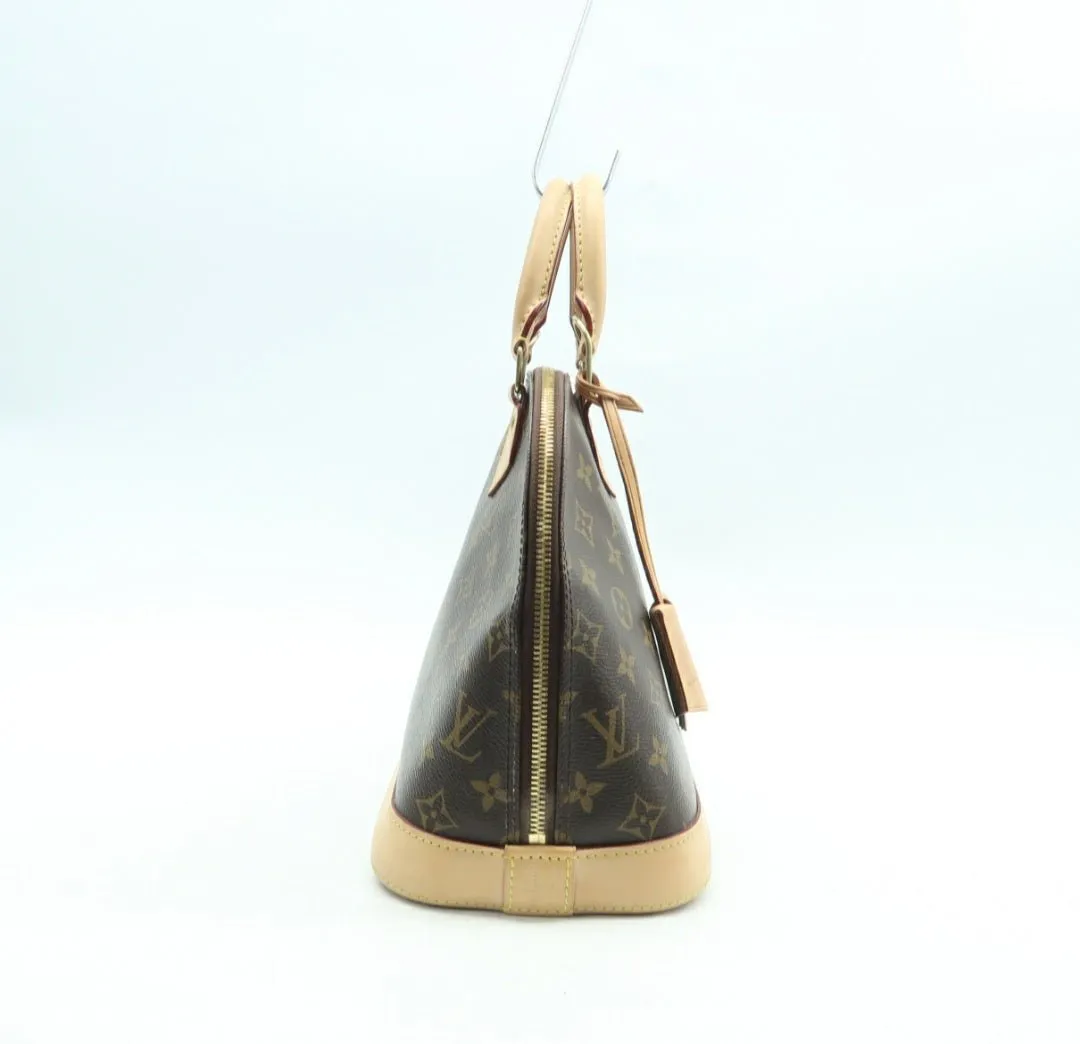 Louis Vuitton Alma Canvas Hand Bag