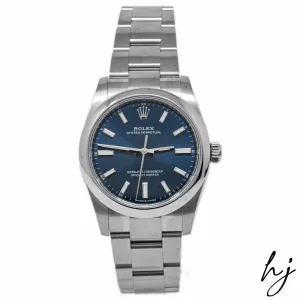 Rolex Oyster Perpetual Stainless Steel 34mm Blue Stick Dial Watch Reference #: 124200