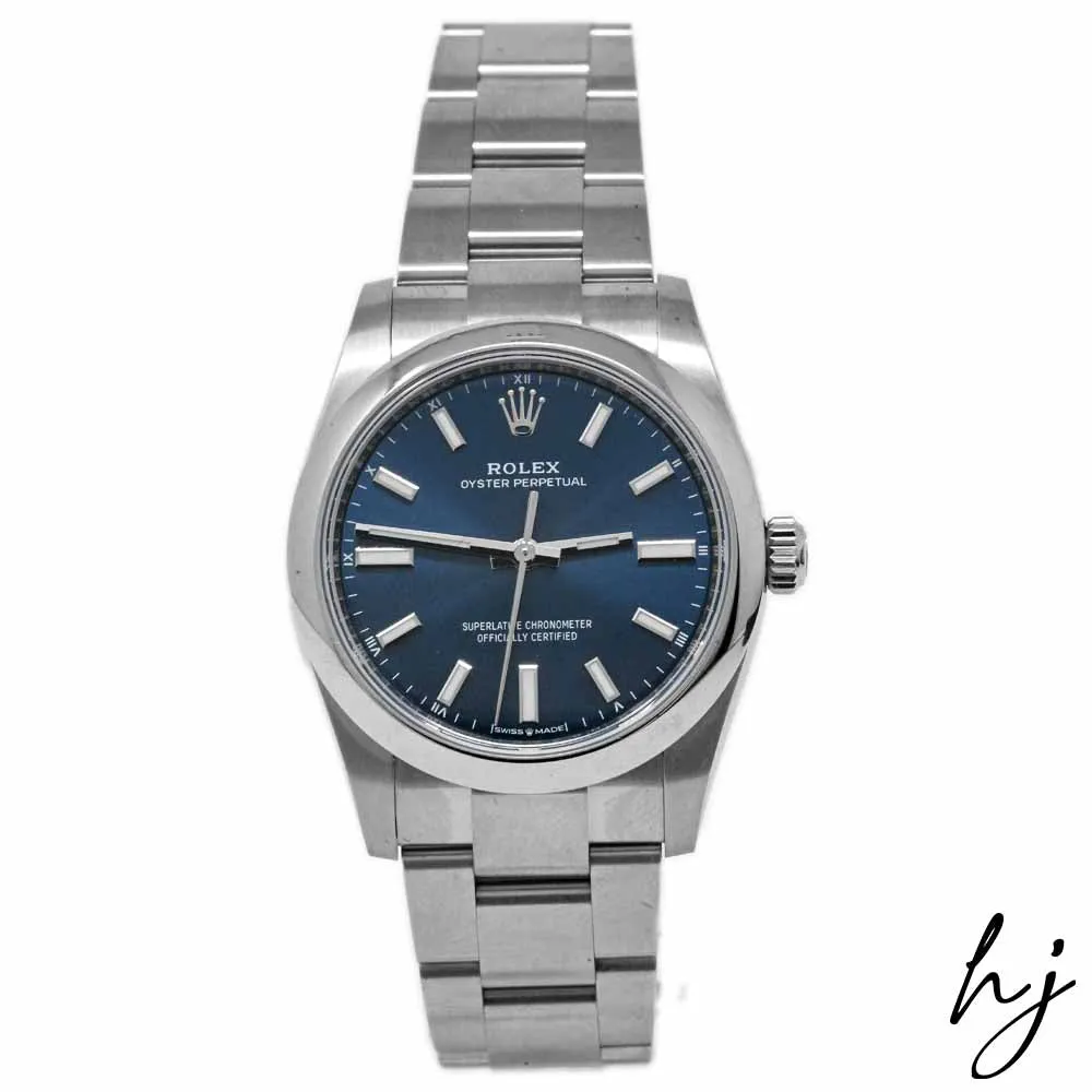 Rolex Oyster Perpetual Stainless Steel 34mm Blue Stick Dial Watch Reference #: 124200