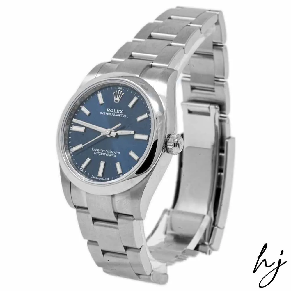 Rolex Oyster Perpetual Stainless Steel 34mm Blue Stick Dial Watch Reference #: 124200