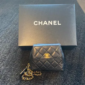 VINTAGE: Chanel Black Quilted Chain Belt Fanny Pack