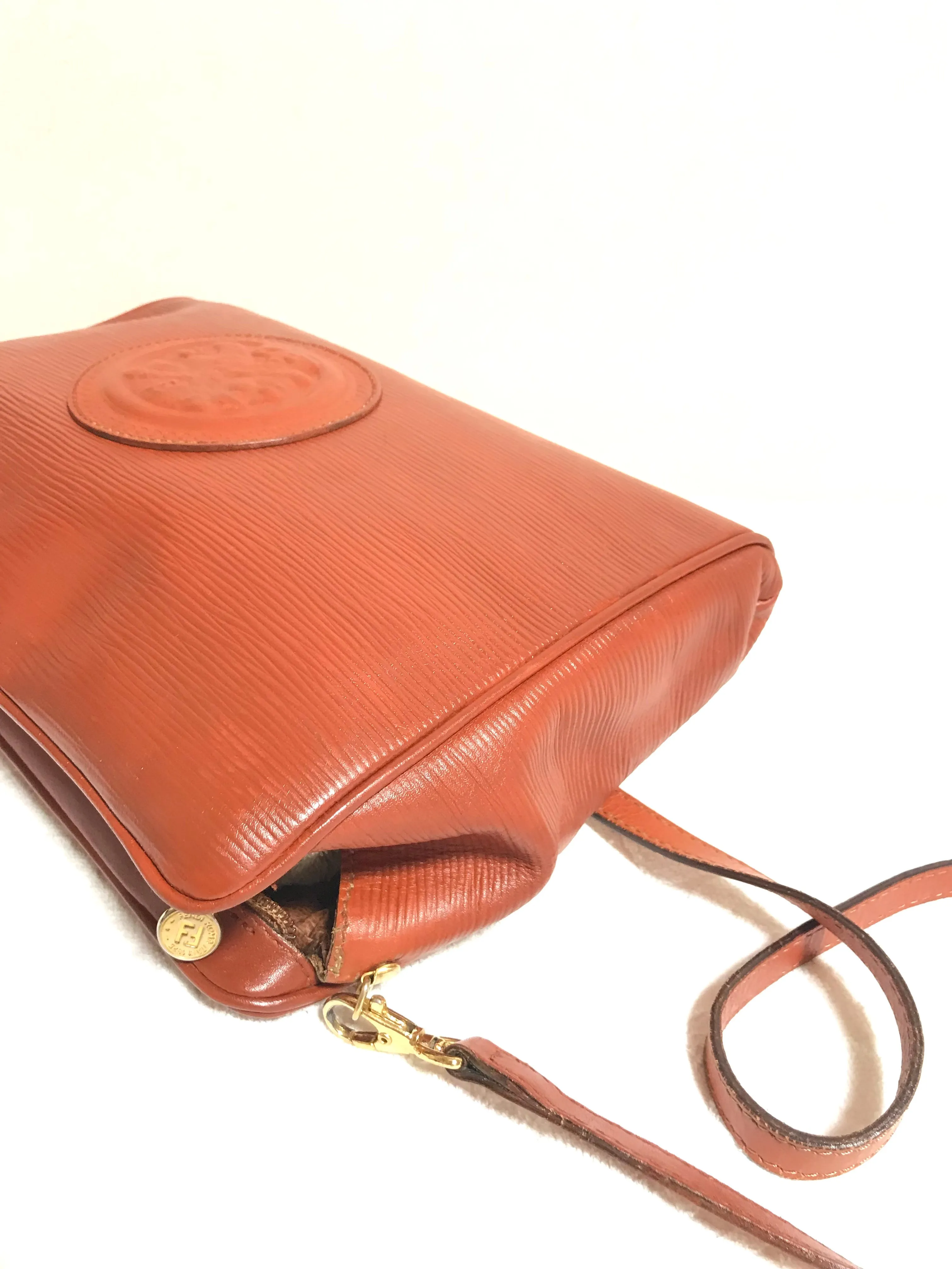 Vintage Fendi brown epi leather messenger bag, shoulder purse with iconic Janus medallion embossed motif at front. Unisex. Rare bag.