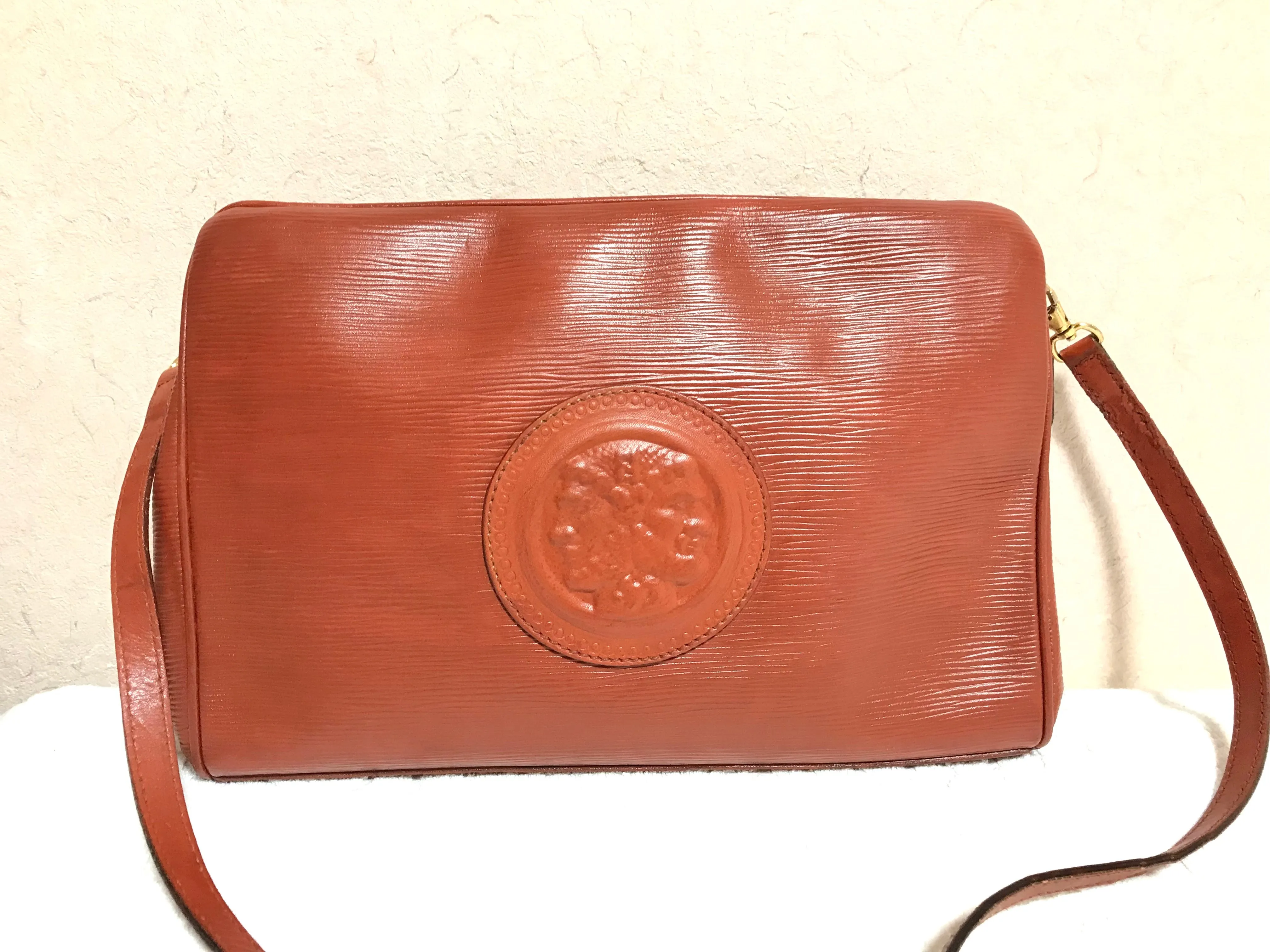 Vintage Fendi brown epi leather messenger bag, shoulder purse with iconic Janus medallion embossed motif at front. Unisex. Rare bag.